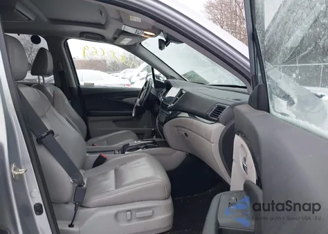 2019 Honda Pilot Touring z USA, uszkodzony, nr VIN 5FNYF6H62KB090155